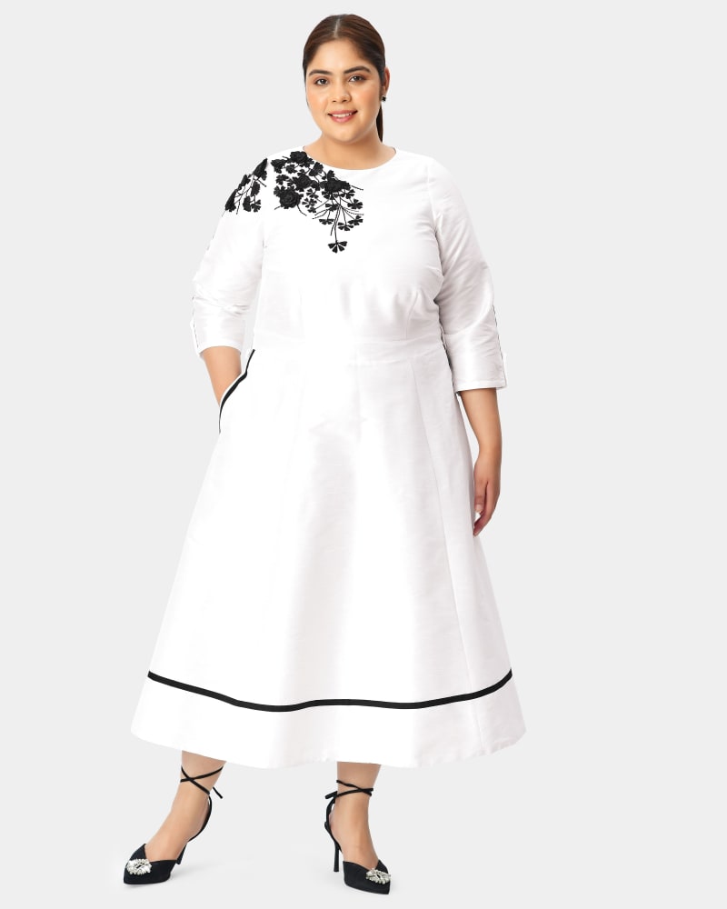 Front of a model wearing a size 6X-36W Floral graphic embellished dupioni dress in White by eShakti. | dia_product_style_image_id:289641